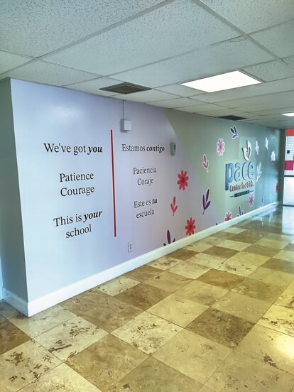An image of colorful wall graphics for the PACE Center for Girls.